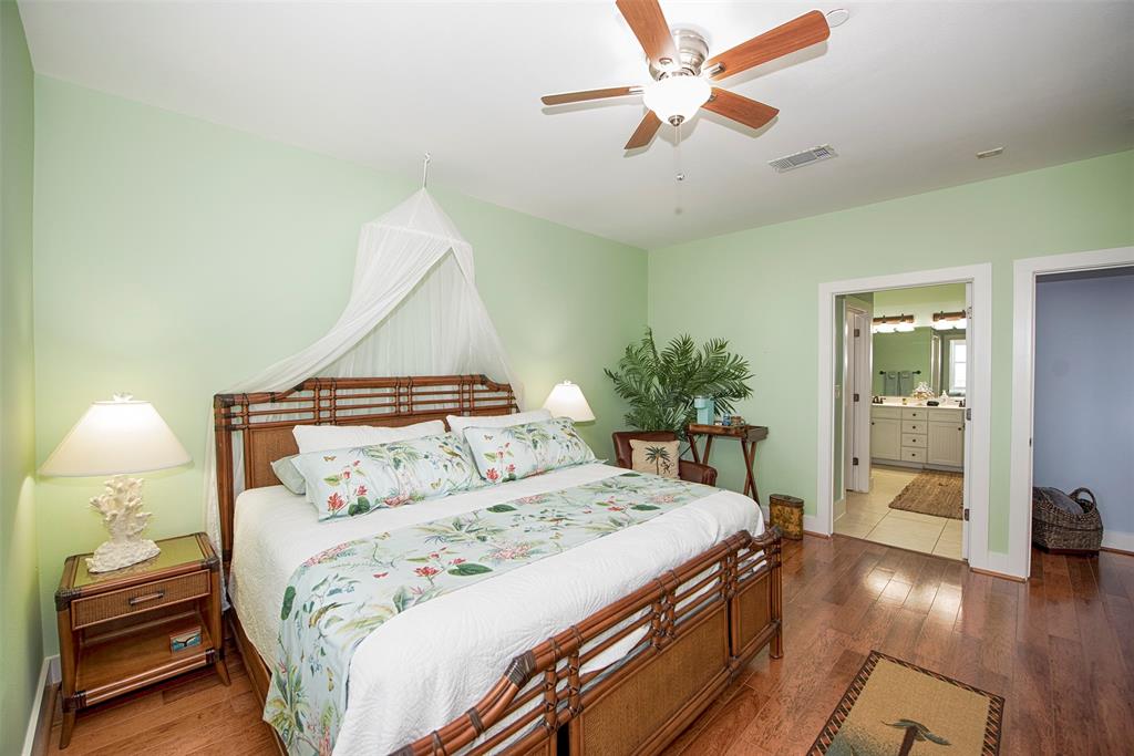 Coastal master bedroom with king bed